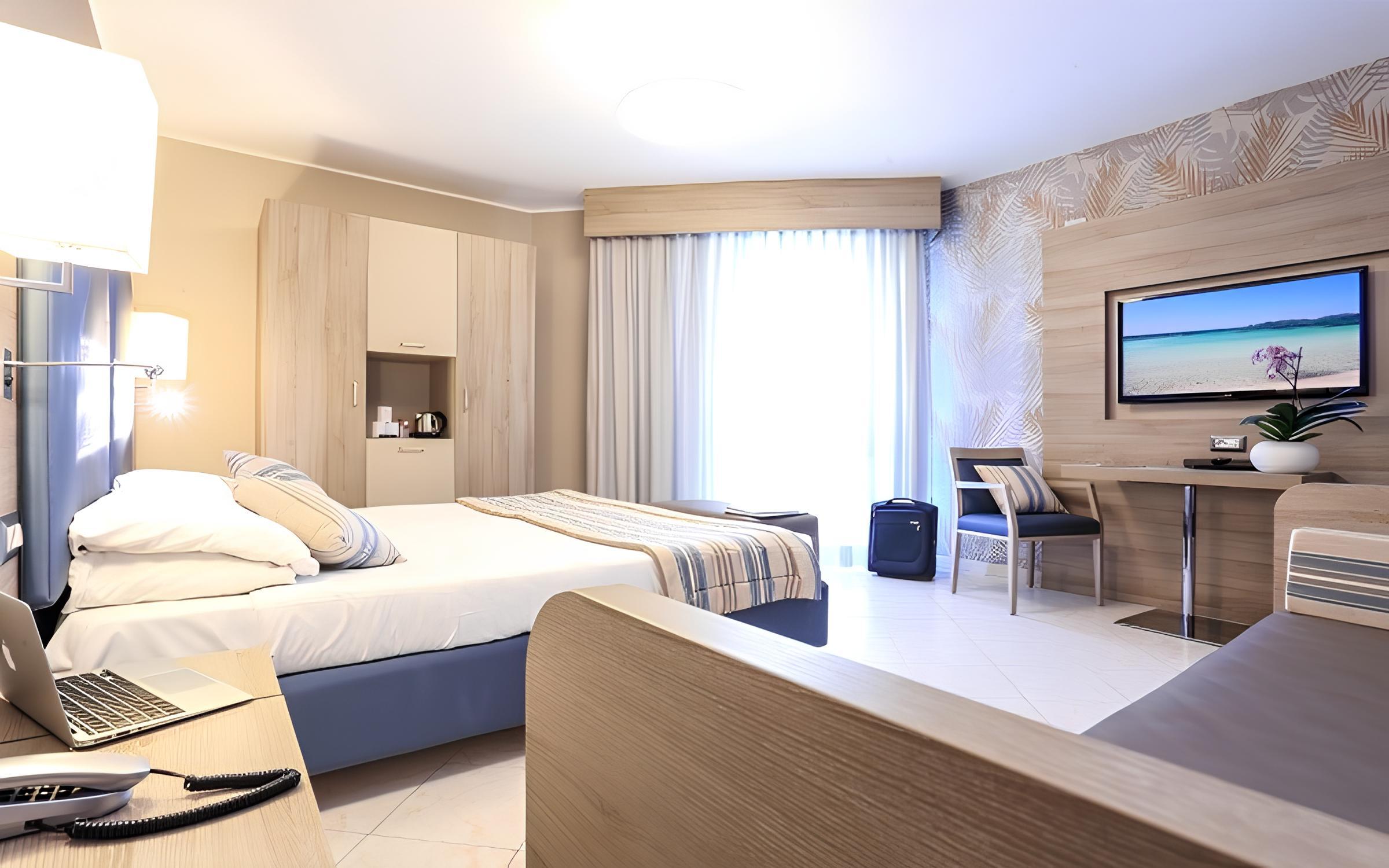 Suite met zithoek — Hotel Alma di Alghero