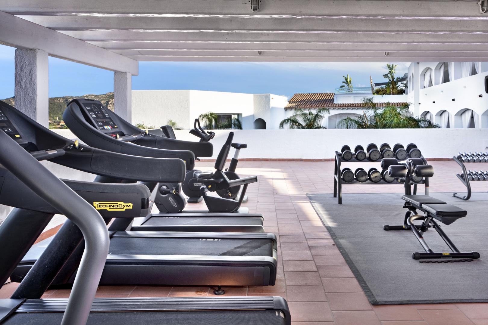 Fitnessruimte met cardio-apparaten — Grand Hotel Cannigione