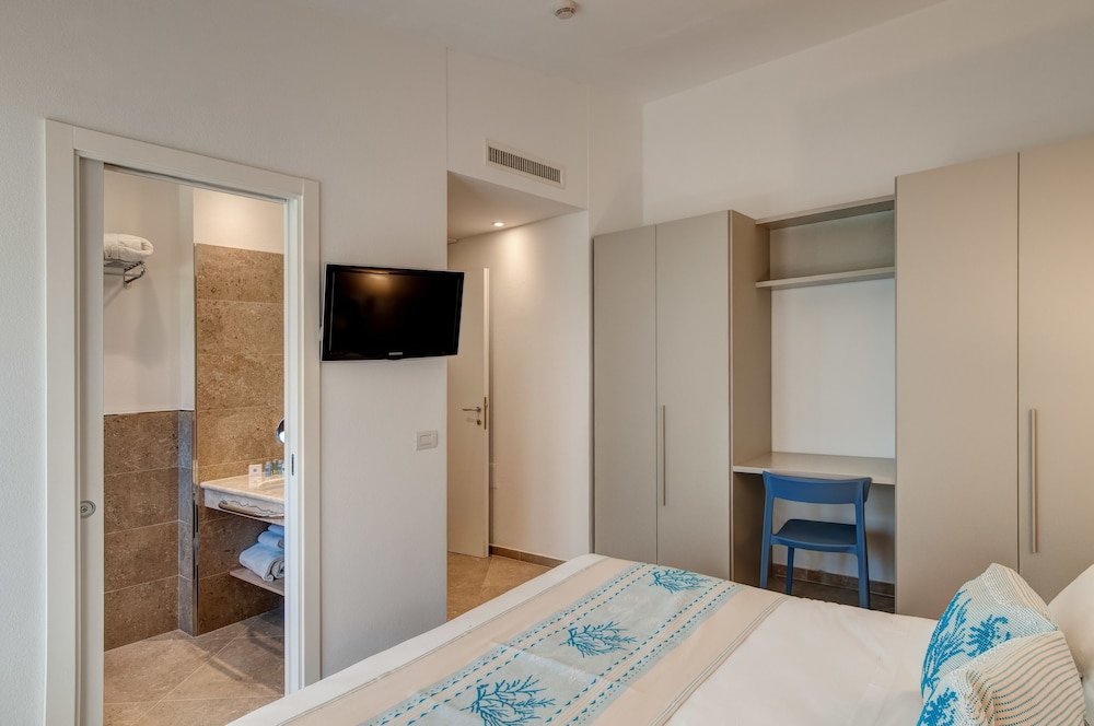 Suite met zithoek — Hotel & Residence Cormoran