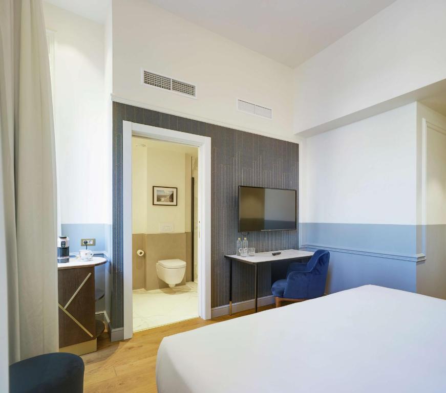 Suite met zithoek — Casa Alberola Alicante Curio Collection by Hilton