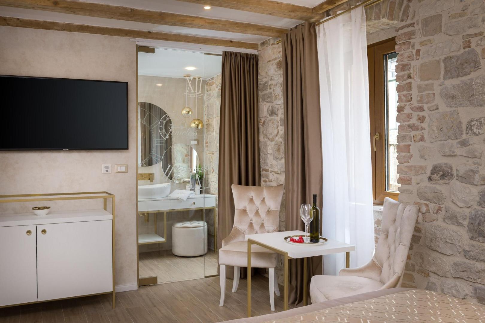 Suite met zithoek — Le Premier Rooms