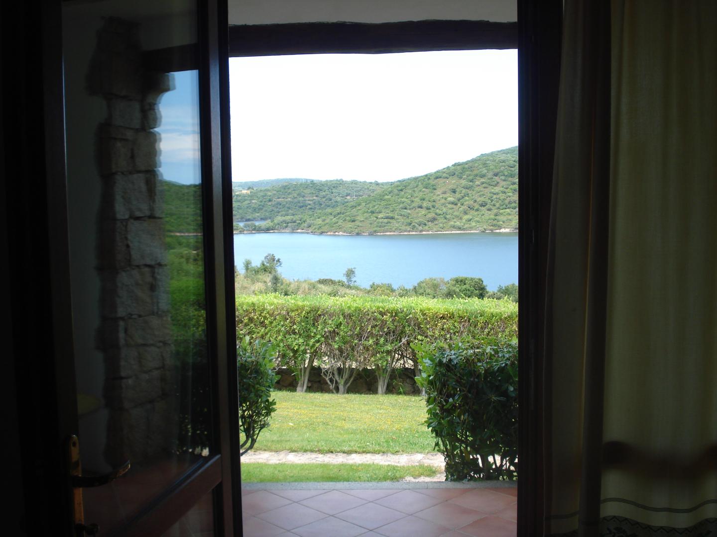 Zeezicht vanaf het balkon — Hotel Relais Valkarana