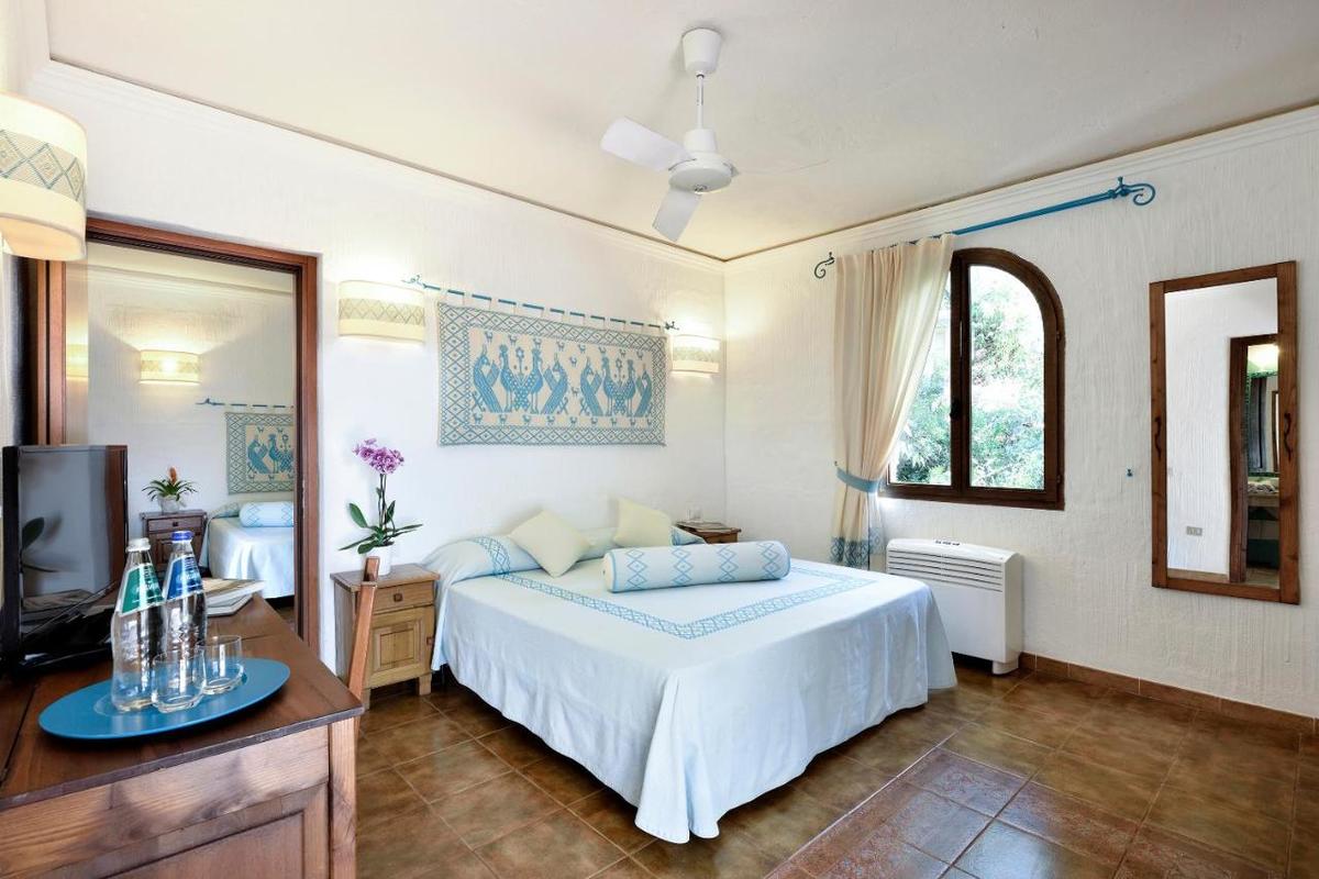 Suite met zithoek — Arbatax Ville del Parco