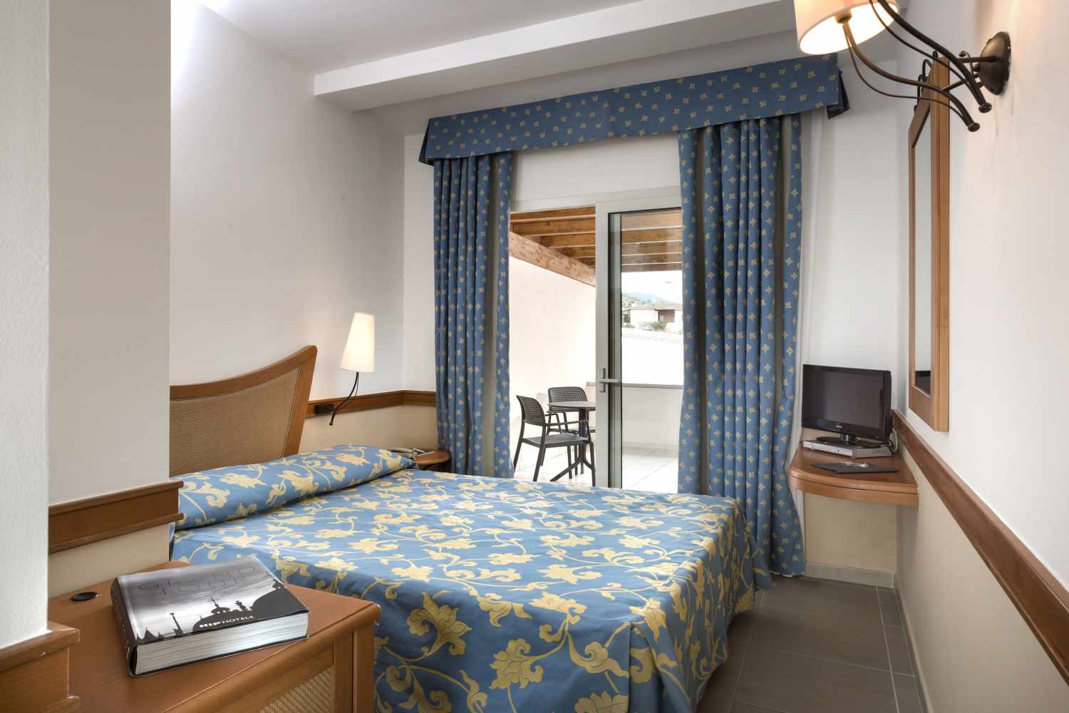 Suite met zithoek — Hotel San Teodoro