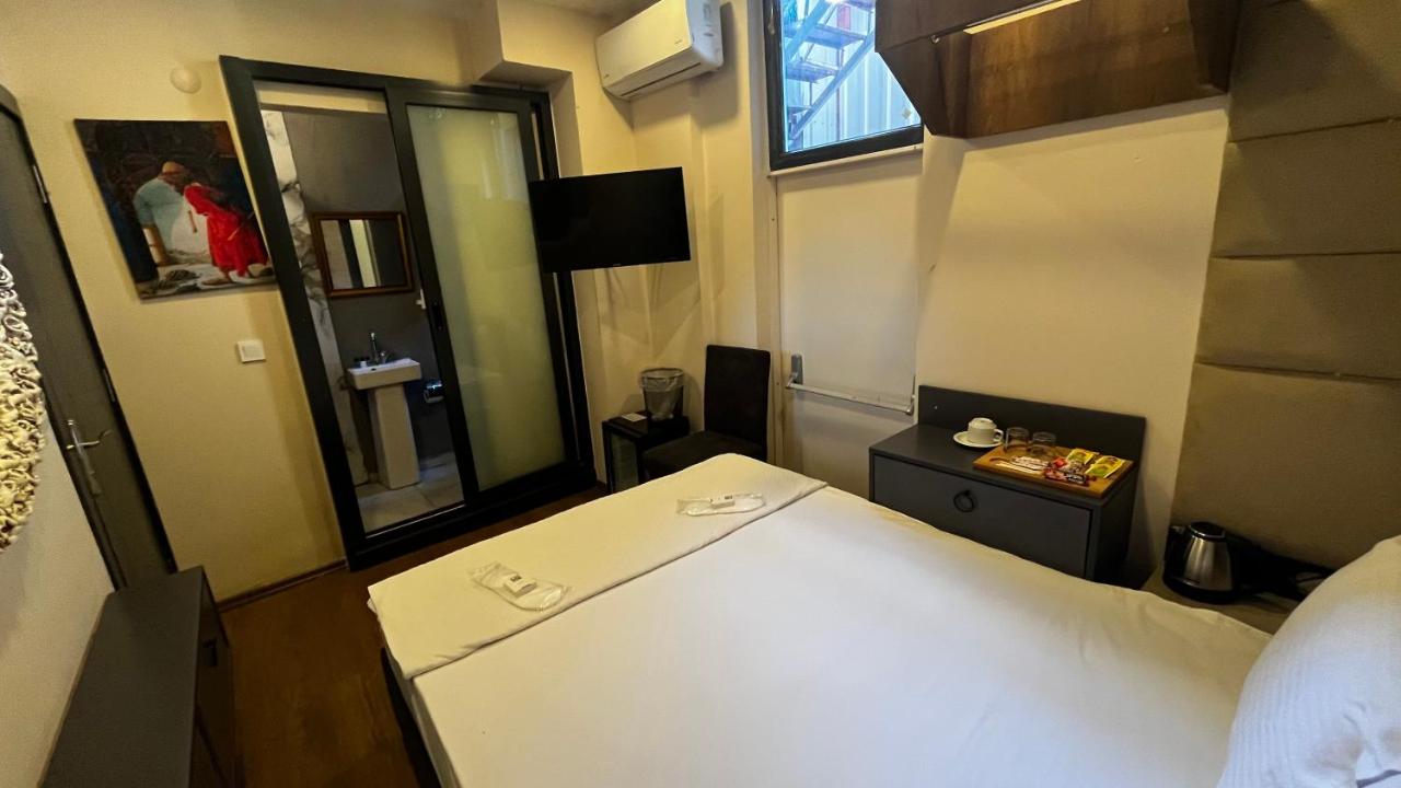 Suite met zithoek — Taxim 34 Hotel