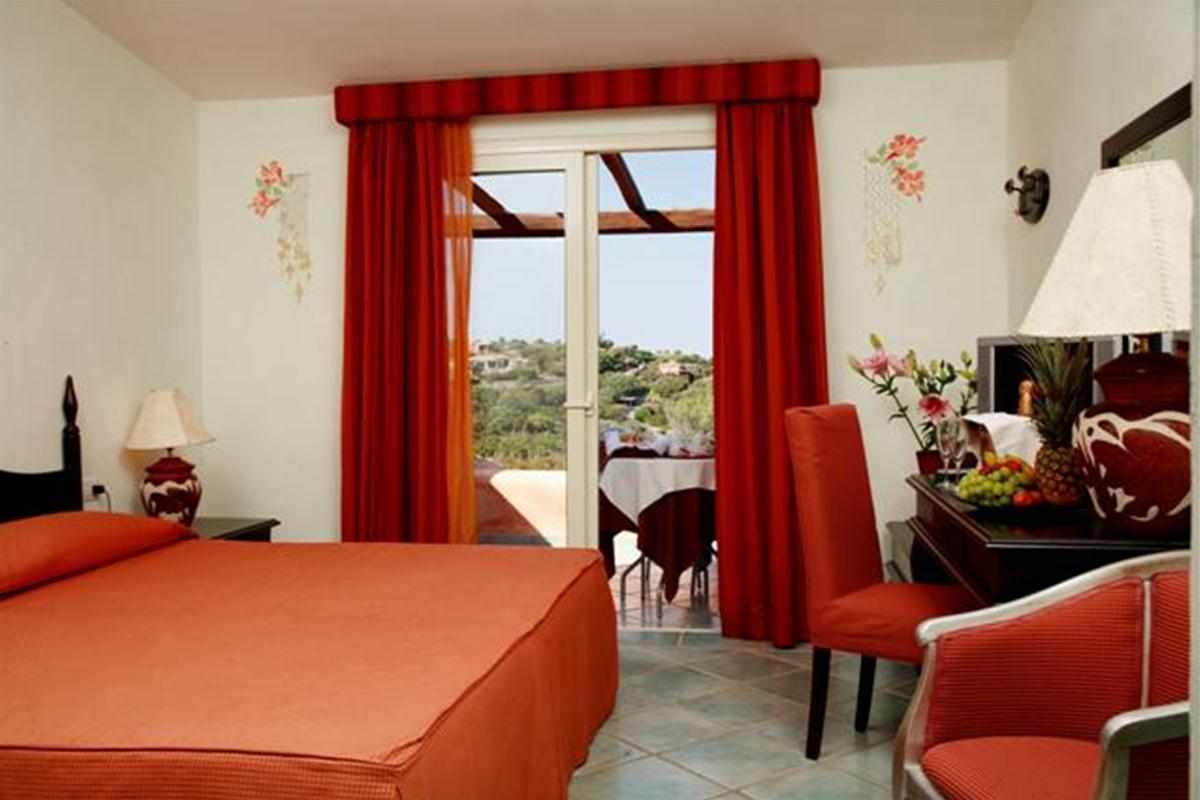 Suite met zithoek — Grand Hotel in Porto Cervo
