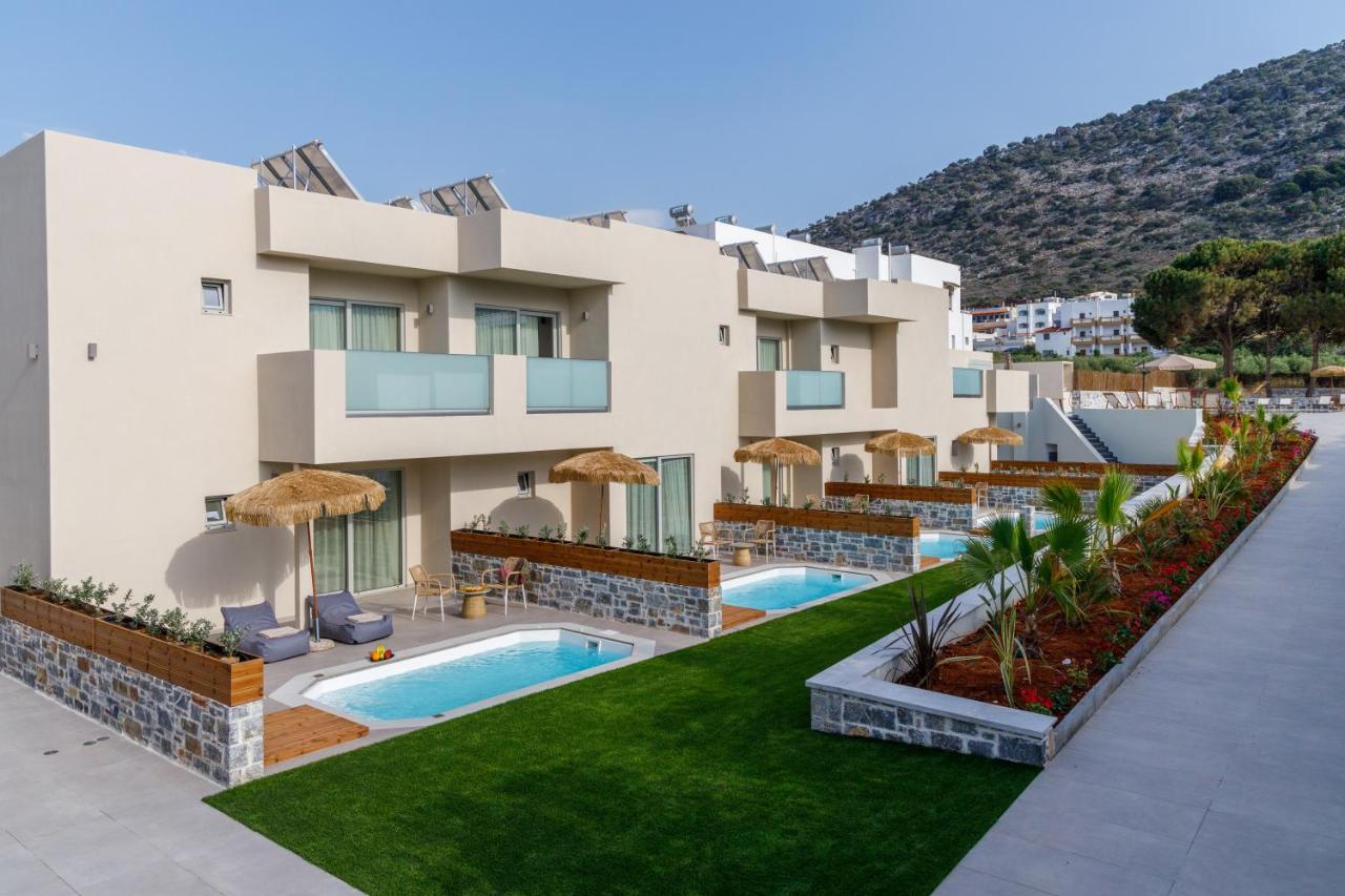 Een exterieurfoto van een resort met twee zwembaden. bij Anassa Stalis Luxury Suites by Estia 'Adults Only' in Stalida
