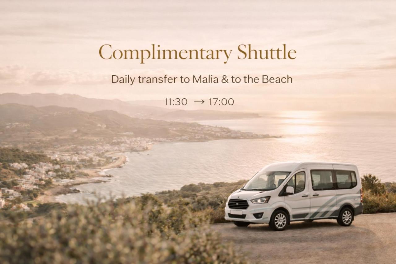 een witte bestelbus geparkeerd op een heuvel naast de oceaan bij The Noverian Scenic Crete 5 Star Hilltop Villa Resort &