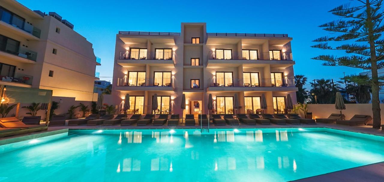 een hotel met een zwembad voor een gebouw bij Cabana Blu Lifestyle Boutique Hotel & Suites in Kardamaina