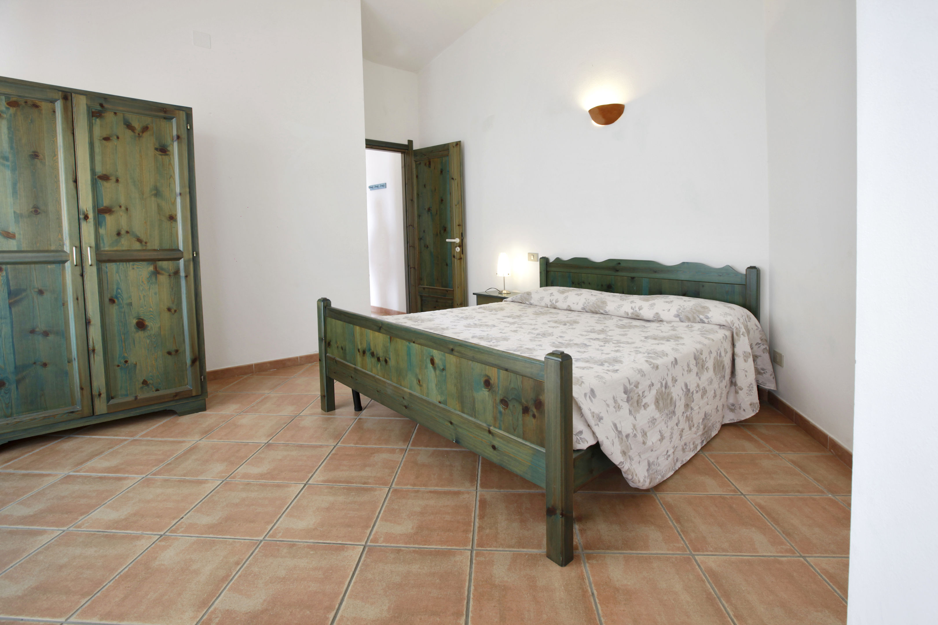 Kamer met twee aparte bedden — Club Esse Residence Capo D’Orso