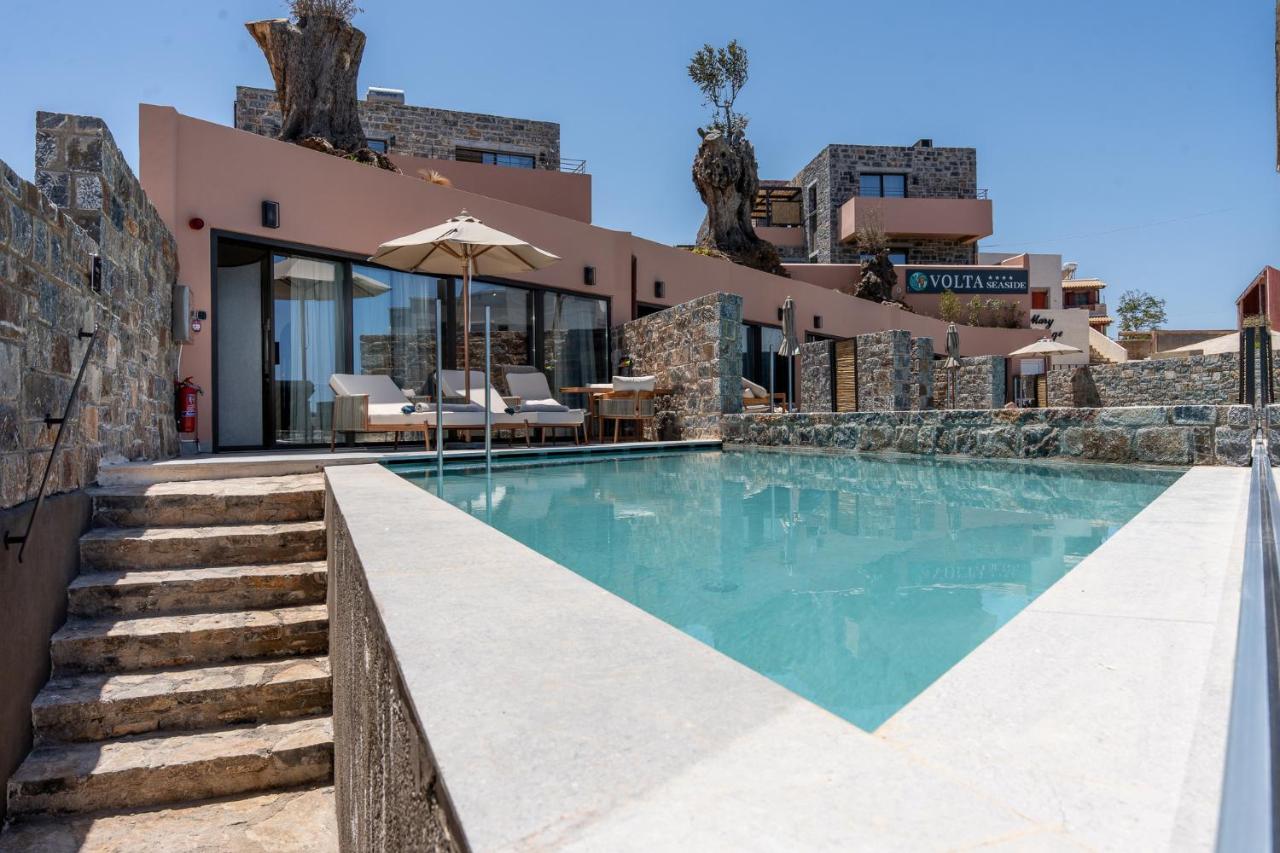 een afbeelding van een zwembad in een villa bij Volta Seaside Boutique Hotel in Kokkíni Khánion