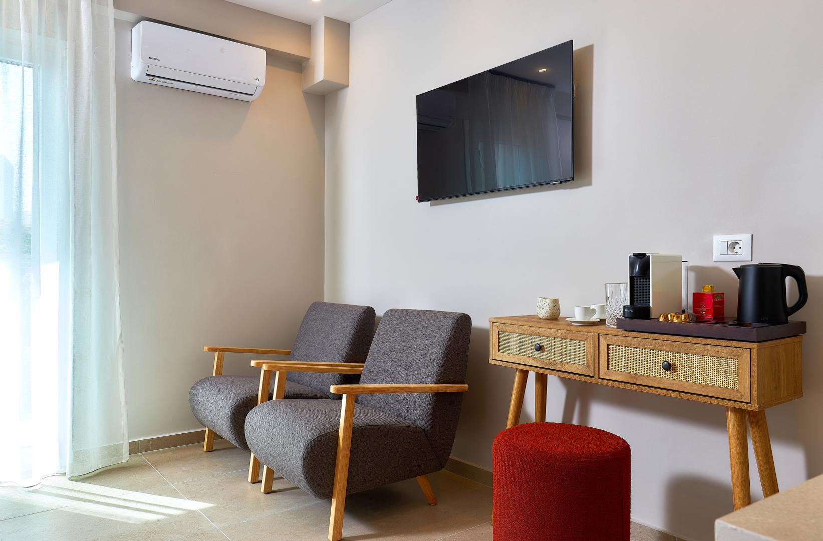 Suite met zithoek — Lotus Rise Hotel