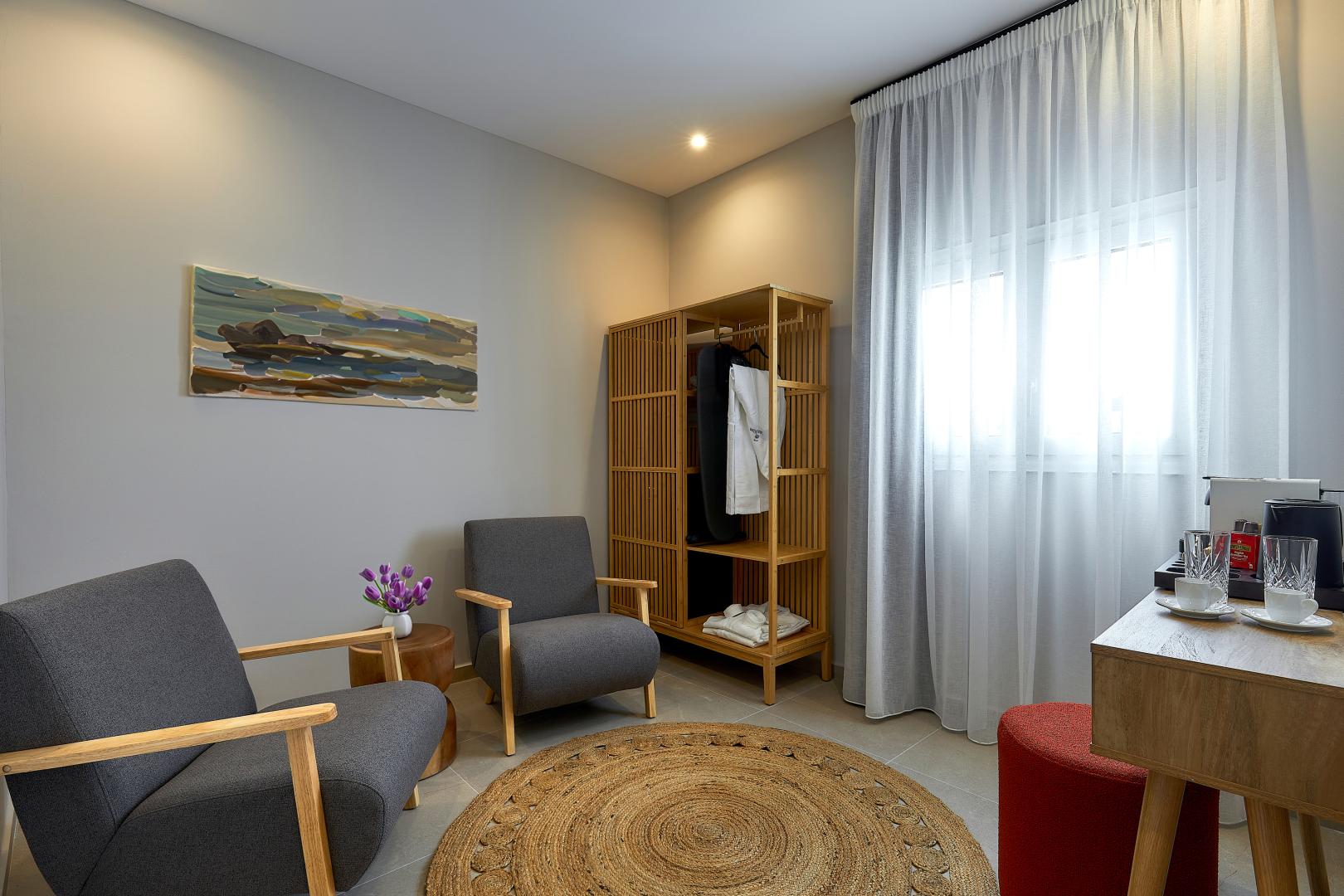 Suite met zithoek — Lotus Rise Hotel