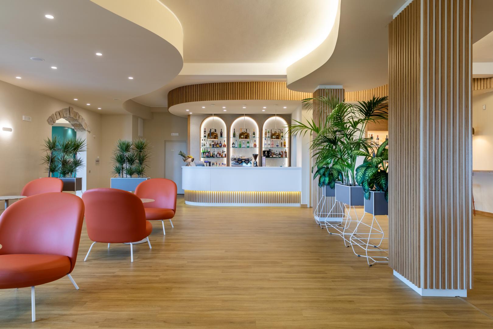 Lobby met receptie — Lu' Hotel Porto Pino