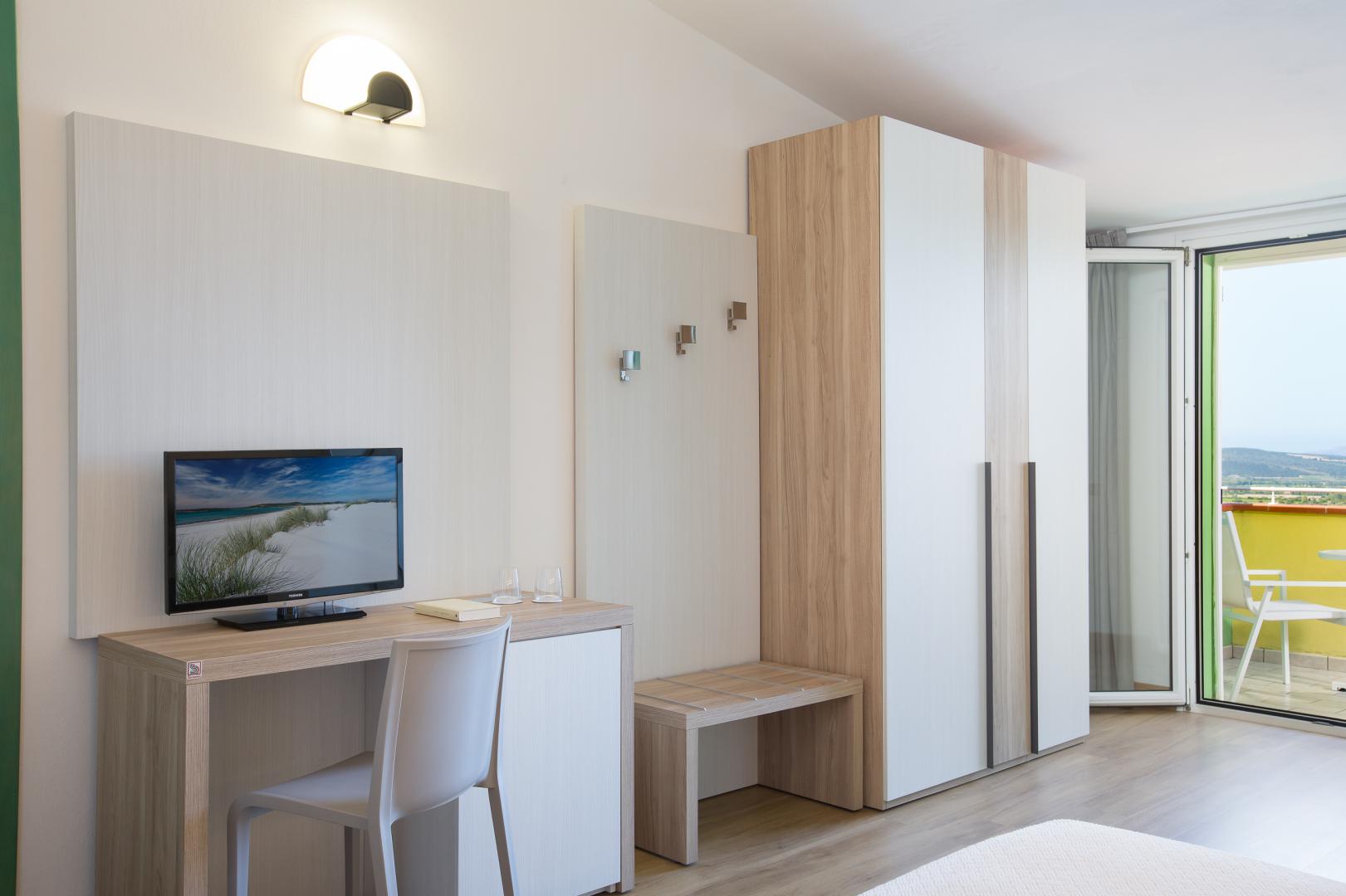 Suite met zithoek — Lu' Hotel Porto Pino