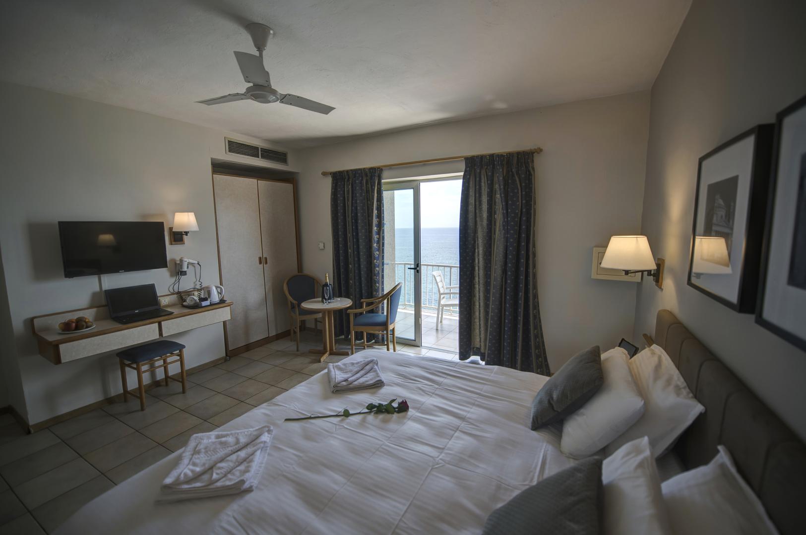 Suite met zithoek — Sliema Chalet Hotel