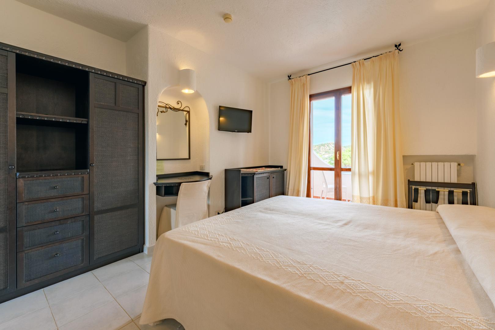 Suite met zithoek — Hotel Punta Est