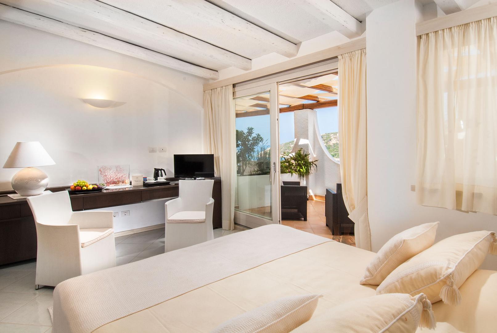 Suite met zithoek — Hotel Punta Est