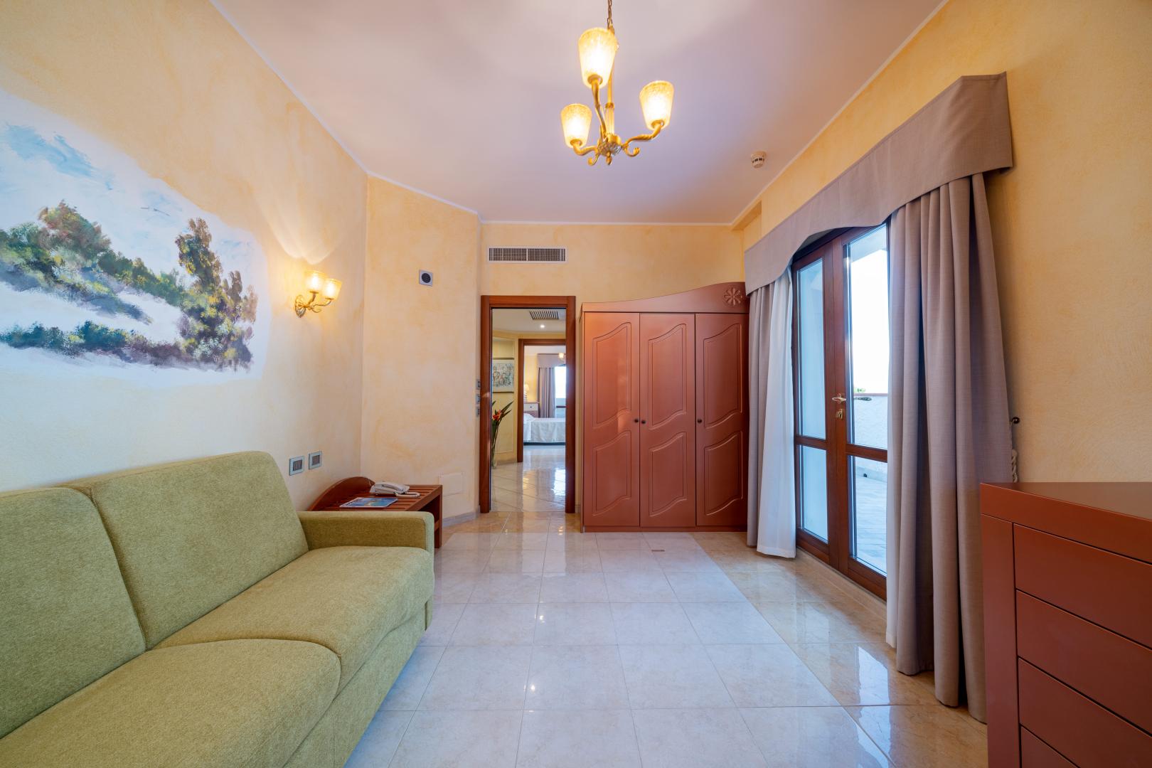 Suite met zithoek — Hotel Punta Negra