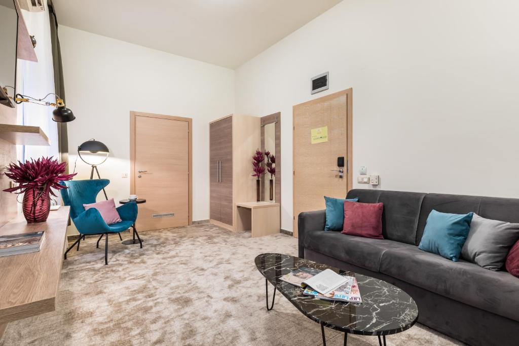 Suite met zithoek — Hotel Mondo
