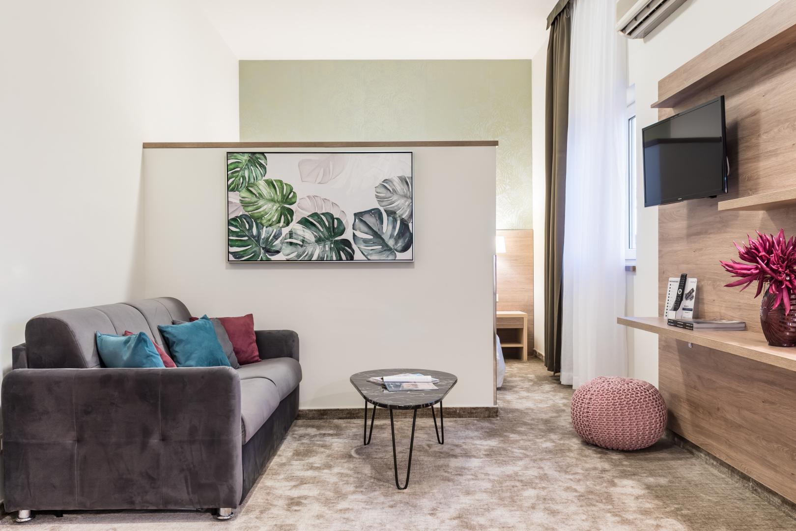 Suite met zithoek — Hotel Mondo