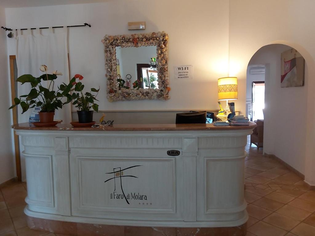 Lobby met receptie — Hotel il Faro di Molara