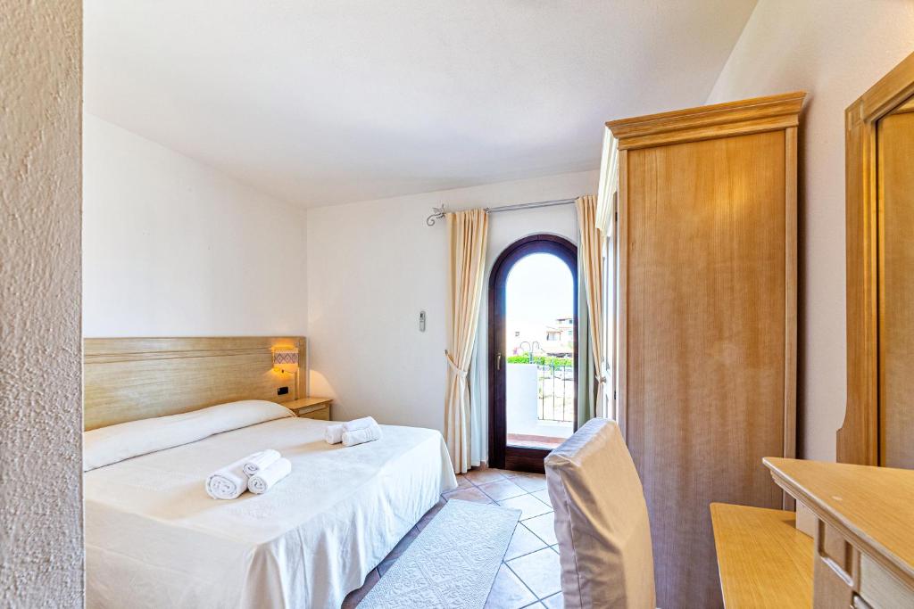 Kamer met tweepersoonsbed — Hotel il Faro di Molara