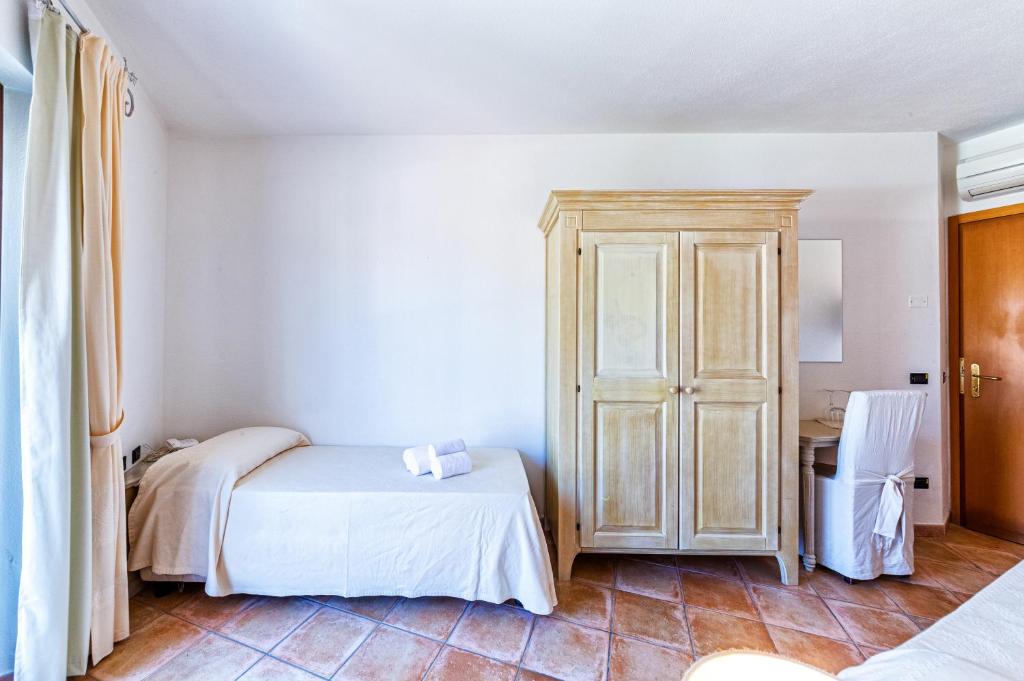 Kamer met tweepersoonsbed — Hotel il Faro di Molara