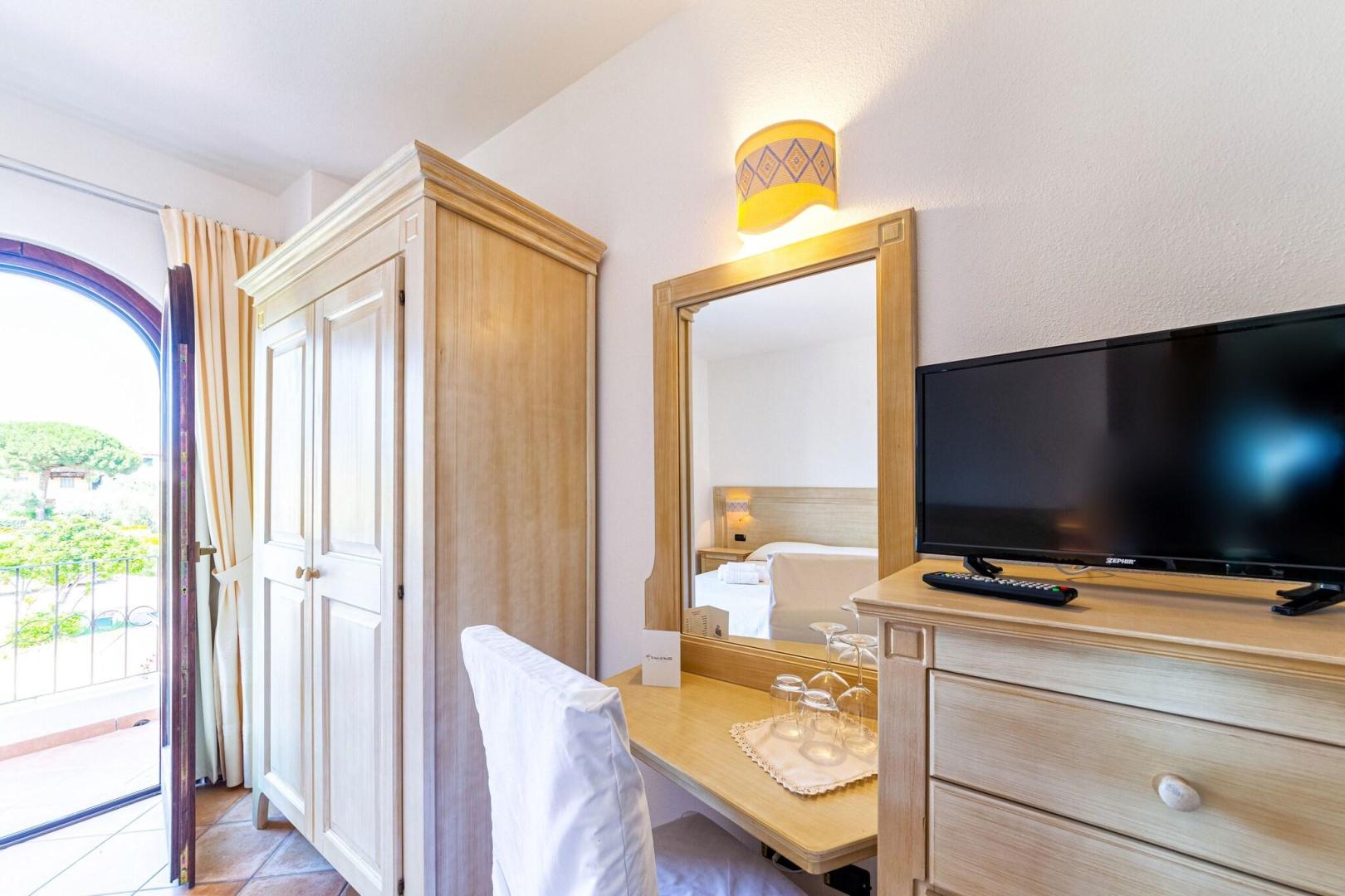 Suite met zithoek — Hotel il Faro di Molara