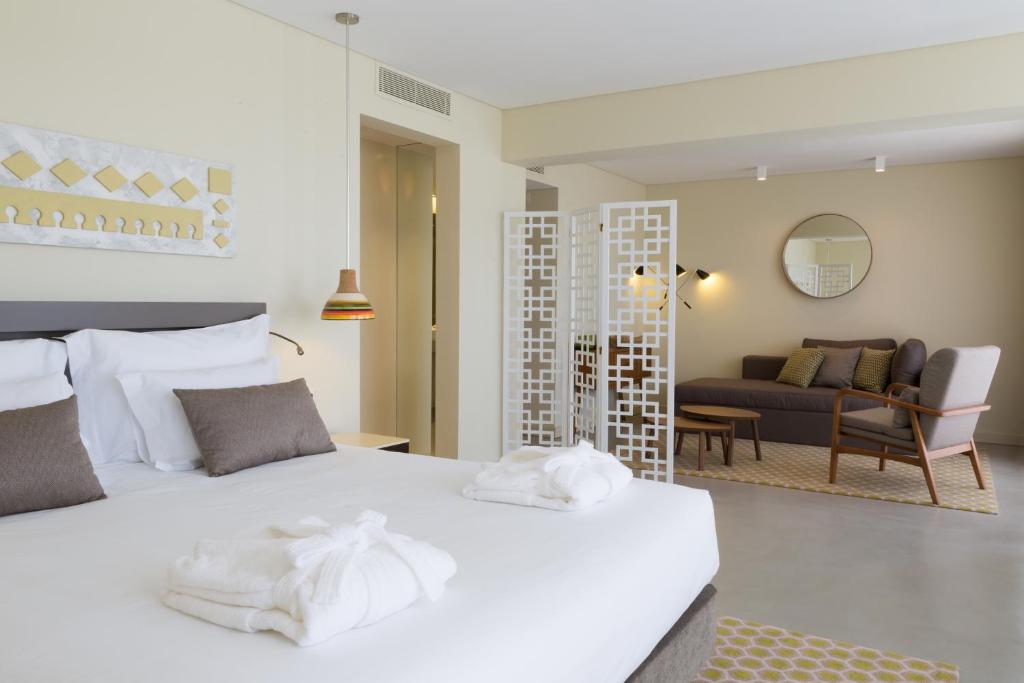 Ozadi Tavira Hotel foto 12