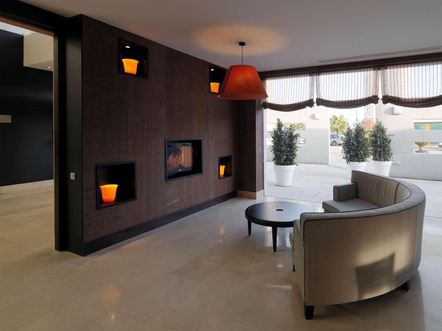 Lobby met receptie — NH Campo de Gibraltar