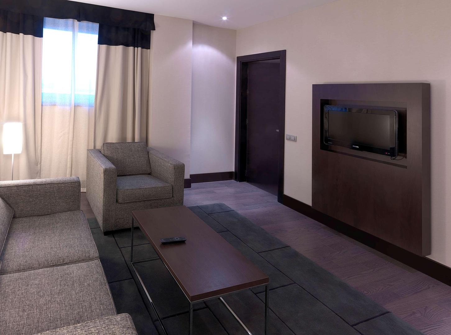 Lobby met receptie — NH Campo de Gibraltar
