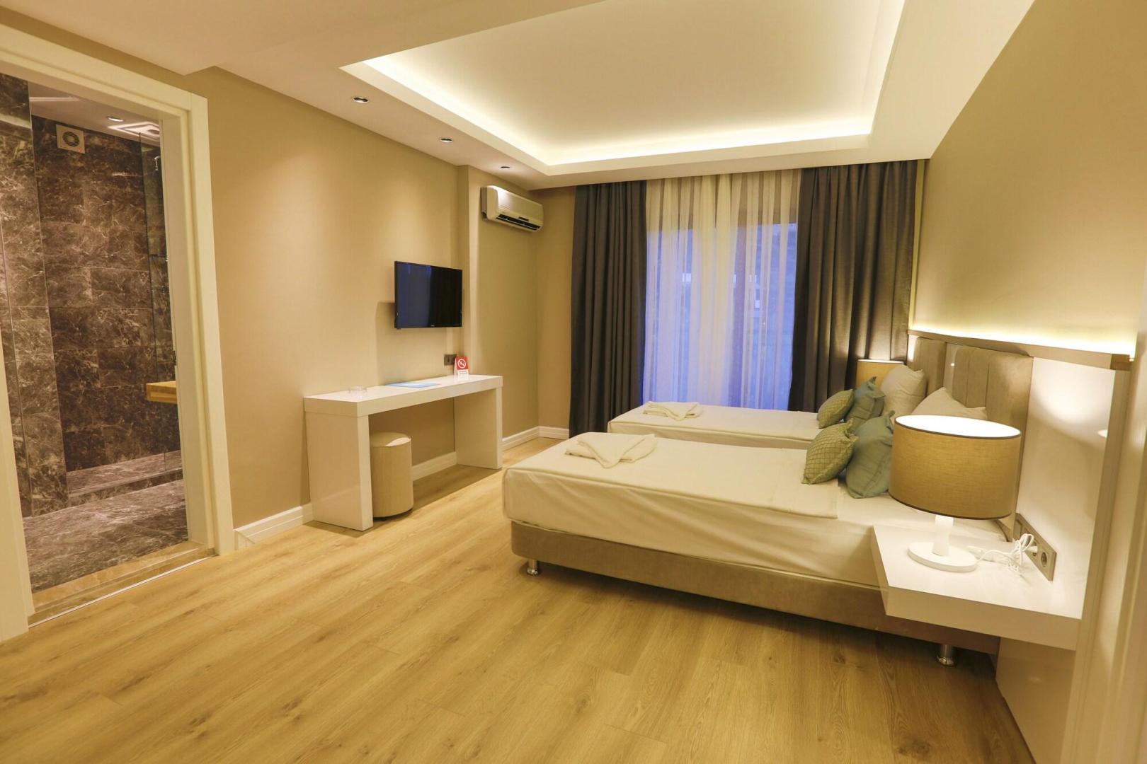 Kamer met twee aparte bedden — Hotel Vita Bella Resort & Spa