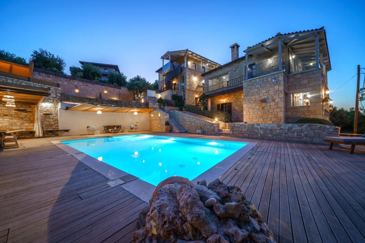 een zwembad voor een huis bij Asion Lithos Villas & Suites with Private Pools in Kato Asites