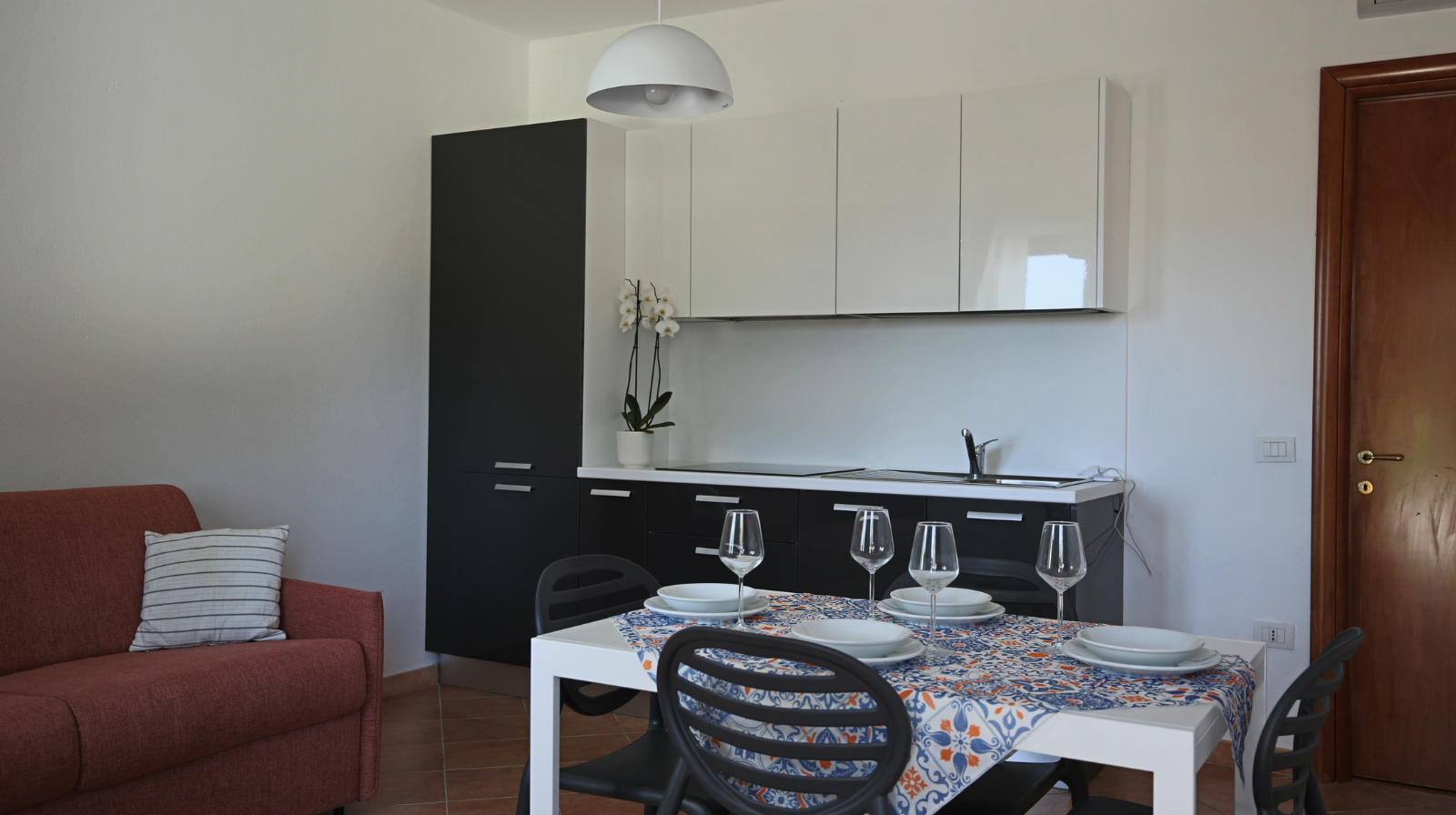 Suite met zithoek — La Smeraldina Resort