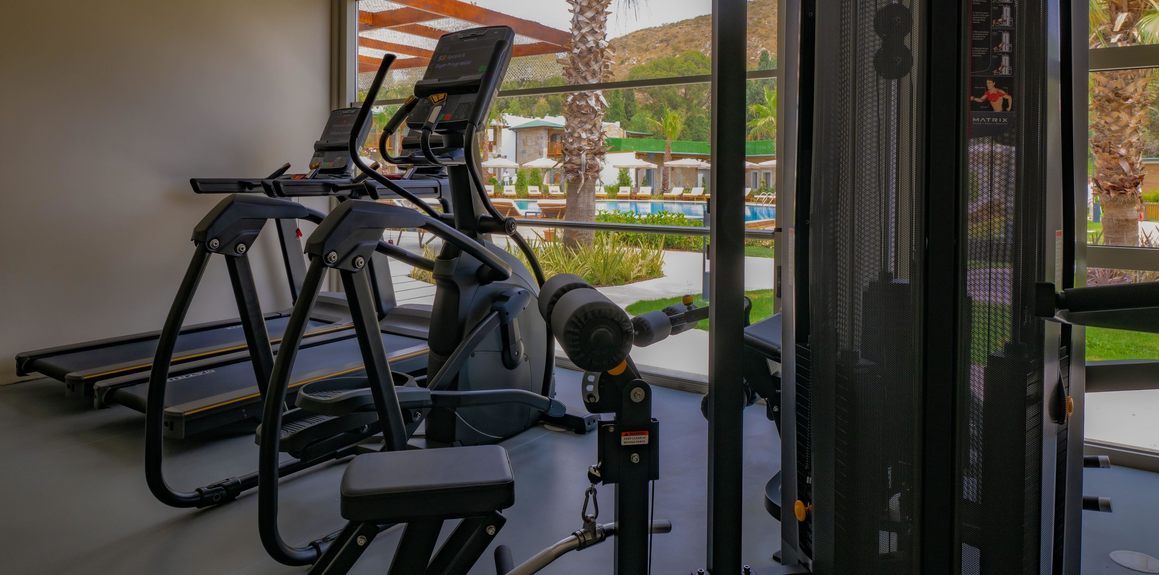 Fitnessruimte met cardio-apparaten — Suum Bodrum Hotel & Beach