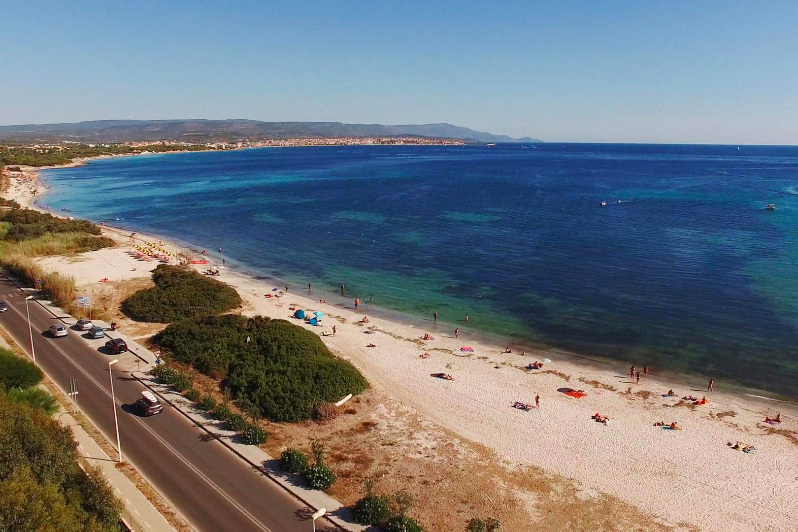 Wit zandstrand met turquoise water — Camping Village Laguna Blu