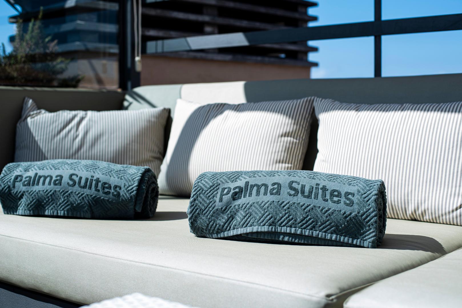 Relaxruimte met ligbedden — Palma Suites