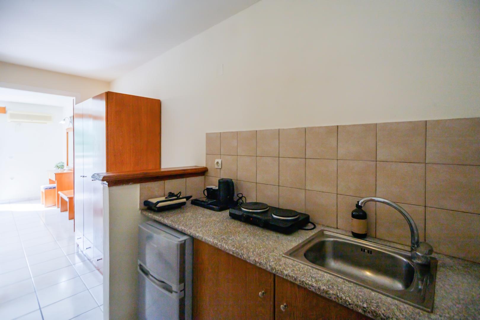 Badkamer met inloopdouche — Vivian Hotel