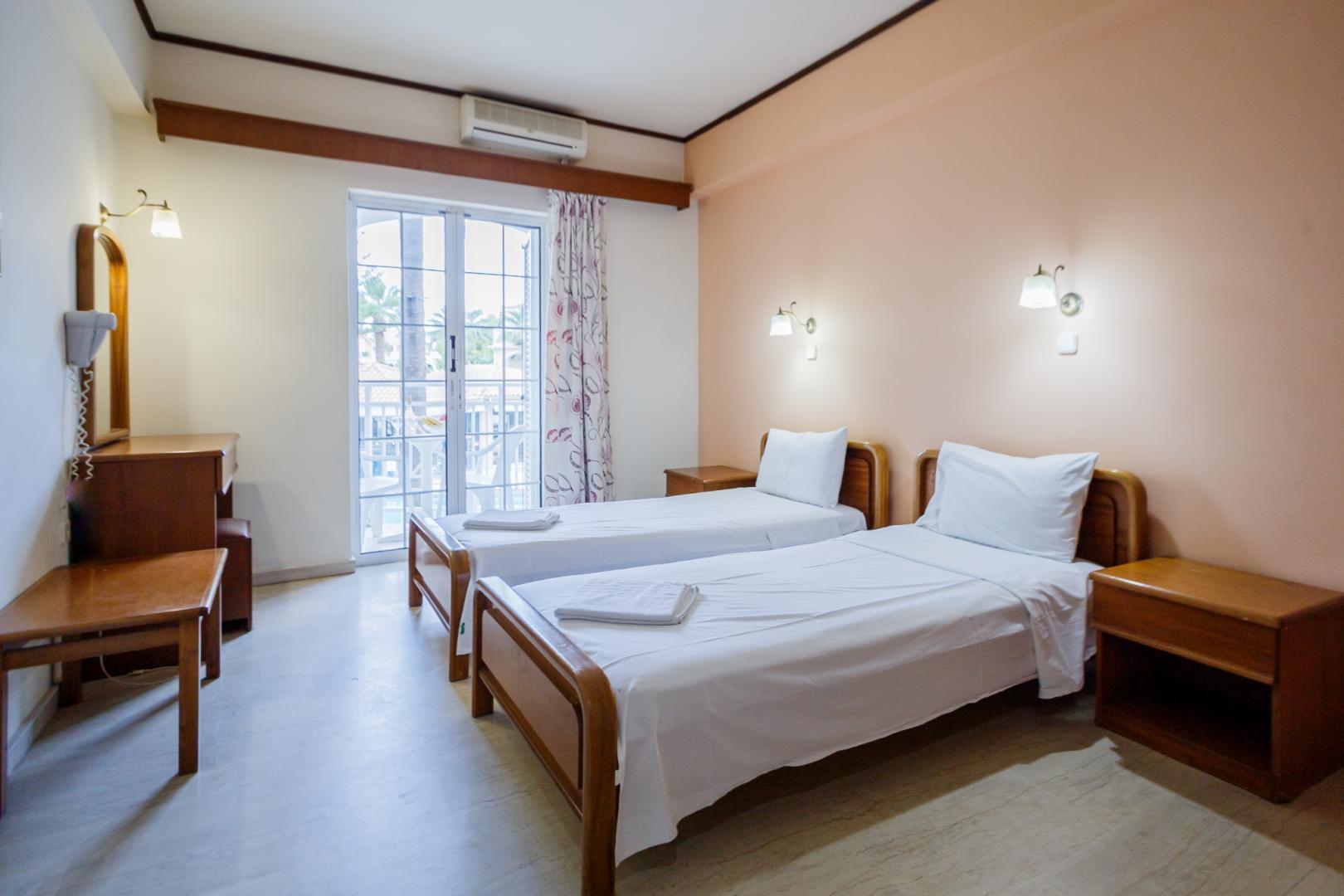 Kamer met twee aparte bedden — Vivian Hotel
