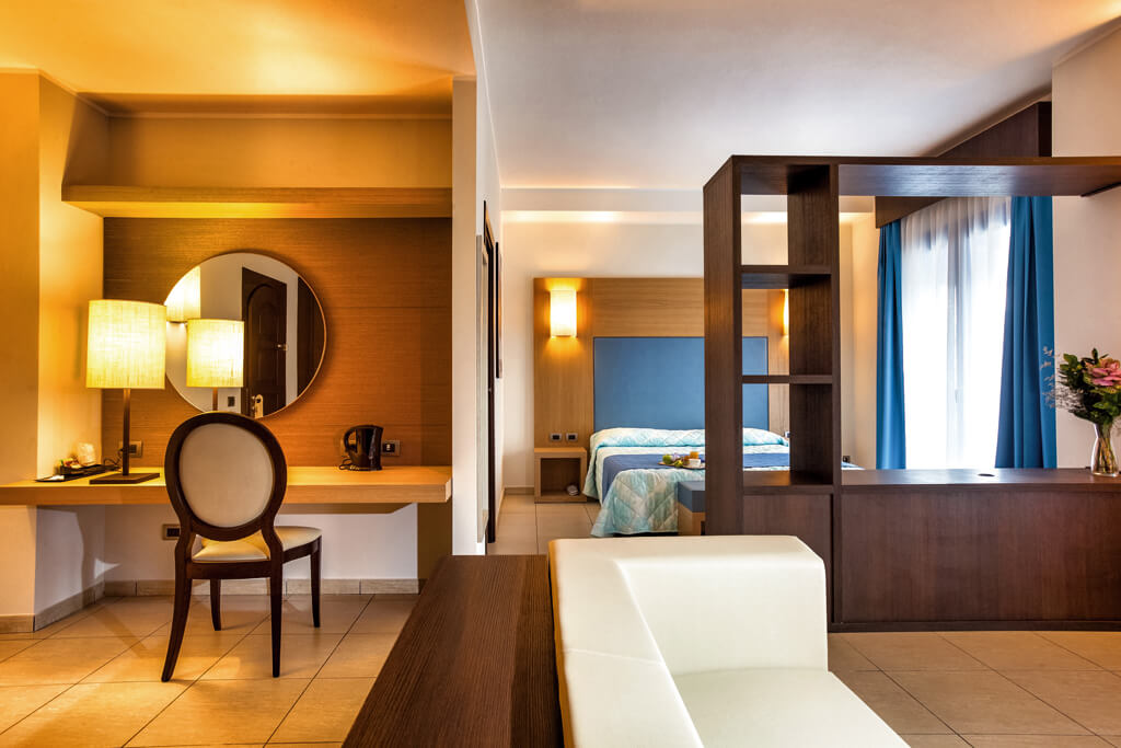 Suite met zithoek — Lu Hotel