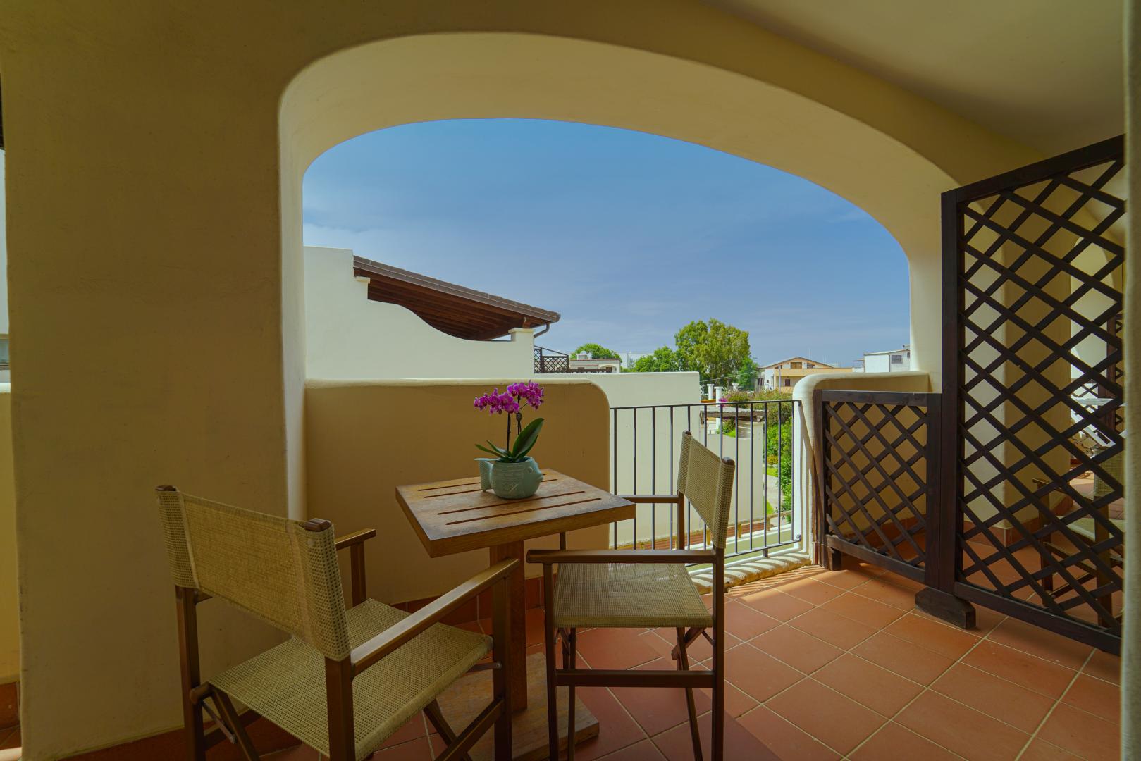 Zeezicht vanaf het balkon — Cala della Torre Resort