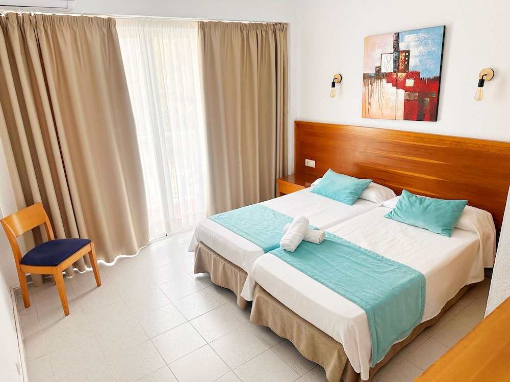 Kamer met twee aparte bedden — Hotel Selva Arenal
