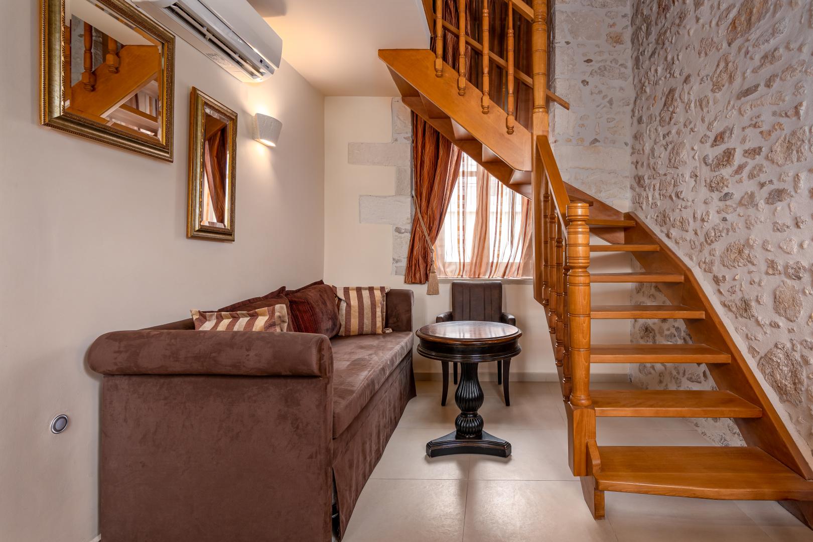 Suite met zithoek — Palazzino di Corina