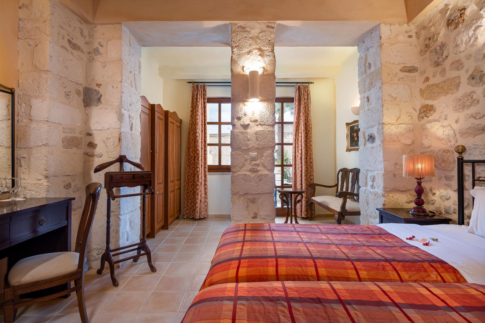 Suite met zithoek — Palazzino di Corina