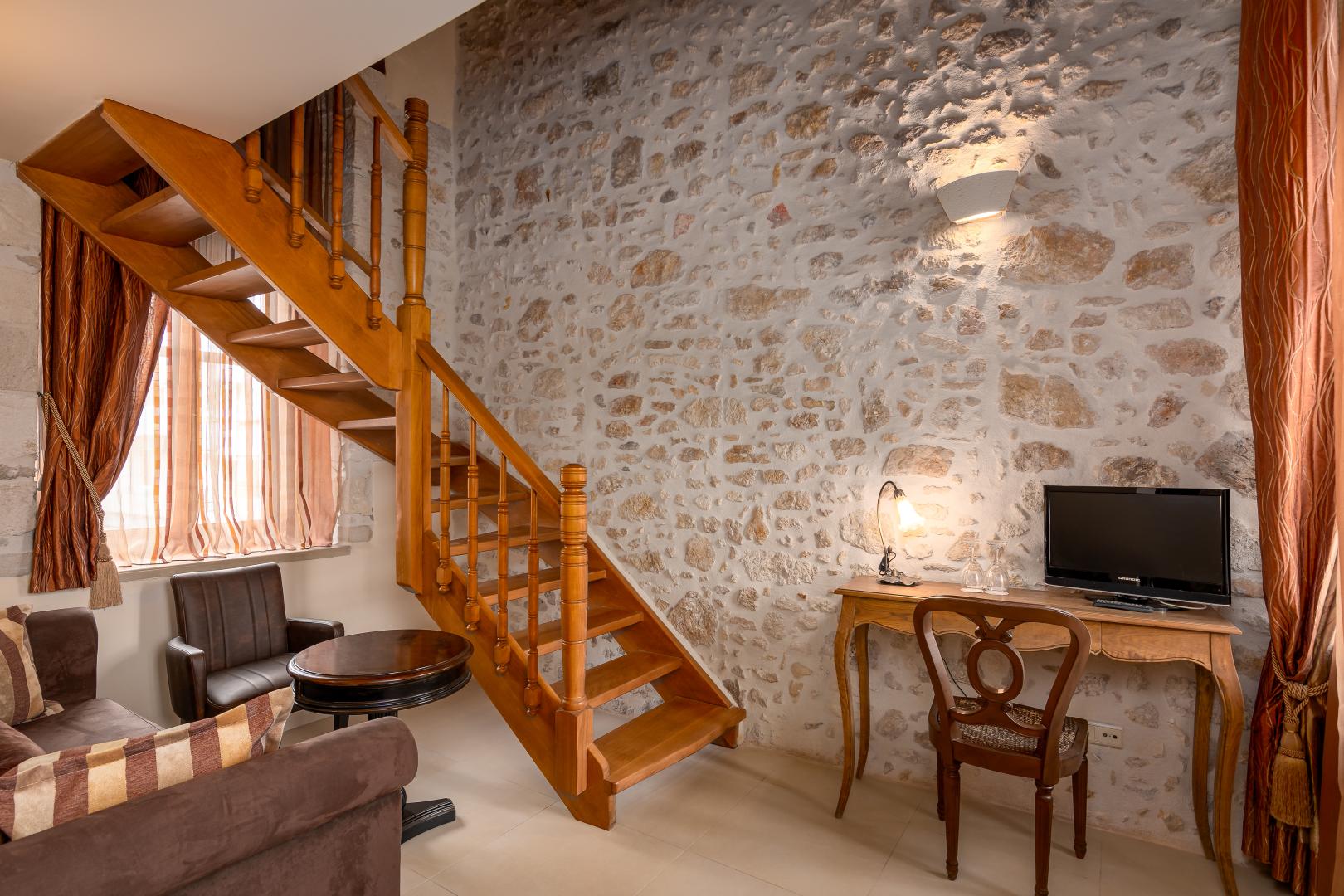 Suite met zithoek — Palazzino di Corina