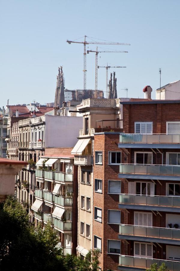 een groep gebouwen in een stad bij AinB Sagrada Familia Apartments in Barcelona
