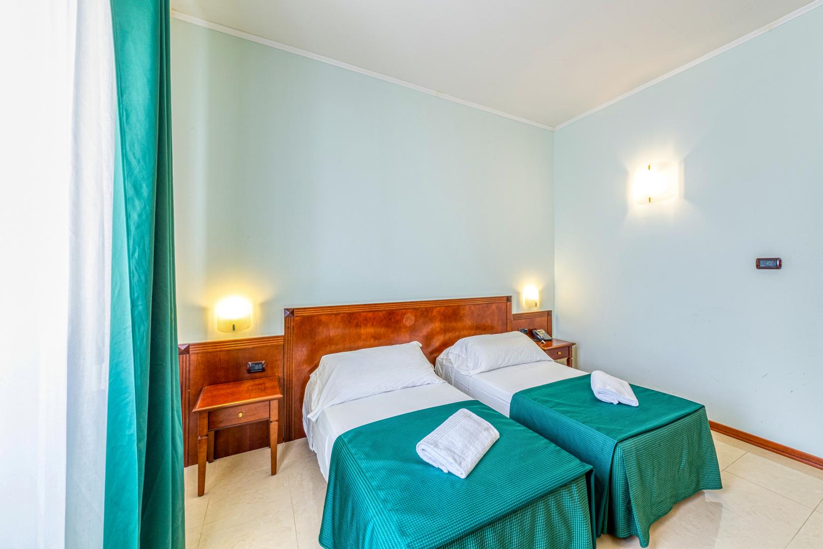 Kamer met twee aparte bedden — Le Torri