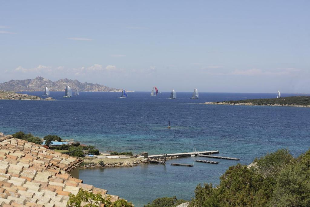 Zeezicht vanaf het balkon — Bagaglino I Giardini di Porto Cervo