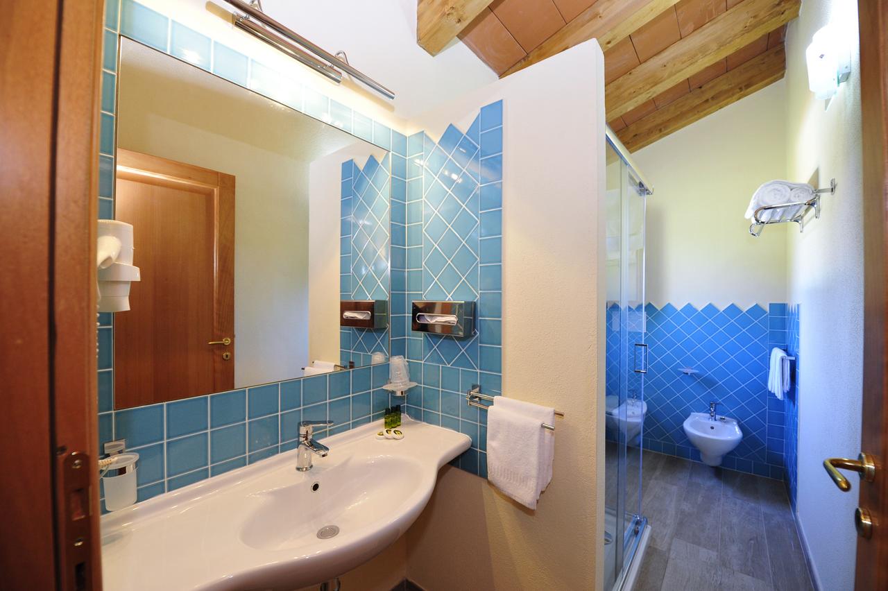 Badkamer met inloopdouche — Hotel L'Esagono